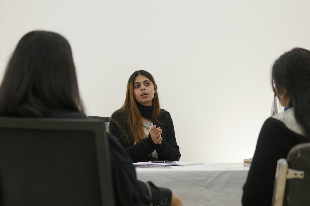 person speaking in meeting